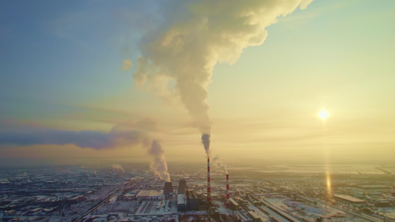 Industrial Power Plant at Sunrise/Sunset in Winter
