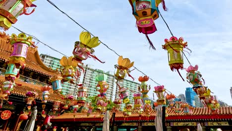 vibrant lanterns hanging at a temple festival