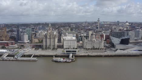 drone shot approaching three graces