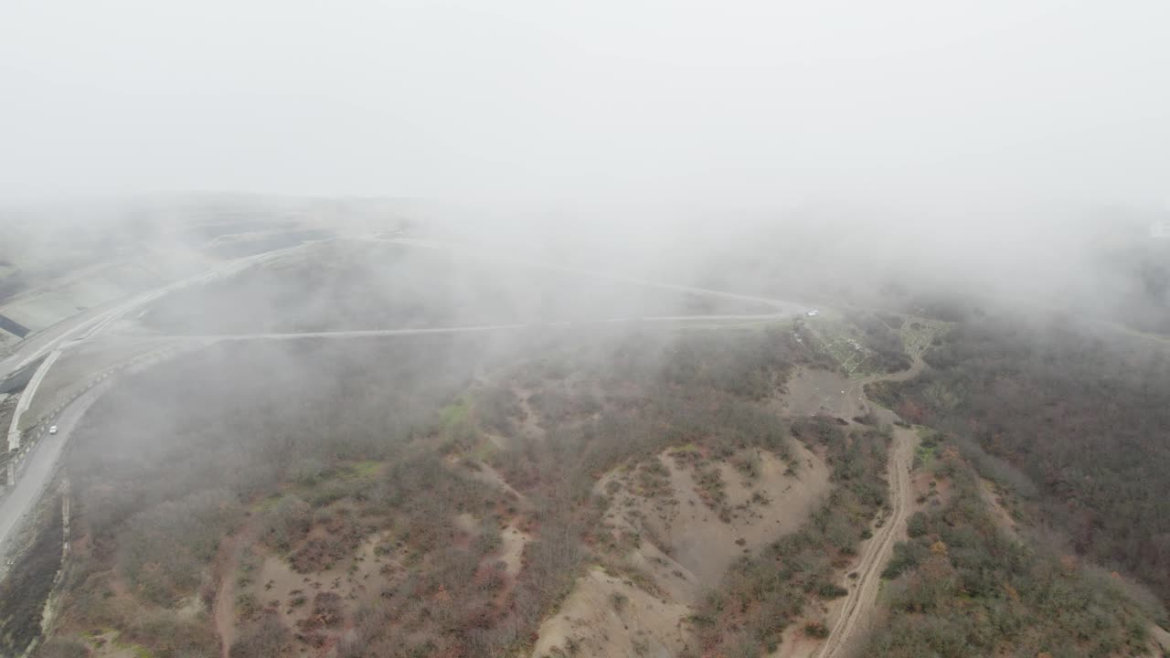 Baku-Shamakhi-Yevlakh Highway winding through foggy hills near Muğanlı village. Azerbaijan