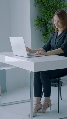 business woman working on laptop