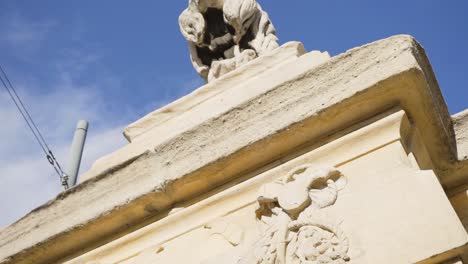 stone lion statue on a building