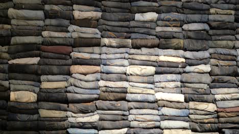 wall of rolled up jeans
