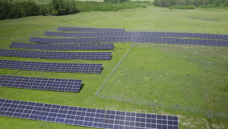 Aerial-birds-eye-shot-of-powerful-eco-friendly-solar-energy-farm-in-rural-countryside-of-Poland