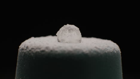 ice ball on powdered dessert