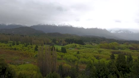 Beautiful-aerial-of-a-rural-valley-and-the-Andes-mountains-near-Bolson-Argentina