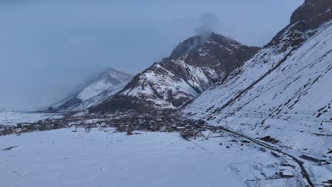 snowy mountain village in himalayas