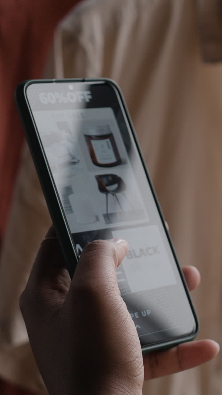 Person browsing online shop on smartphone