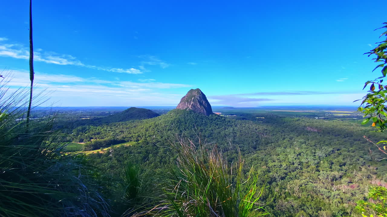 Awesome digital zoom view of Mount Tibrogargan from Mount Tibberoowuccum summit on a sunny day