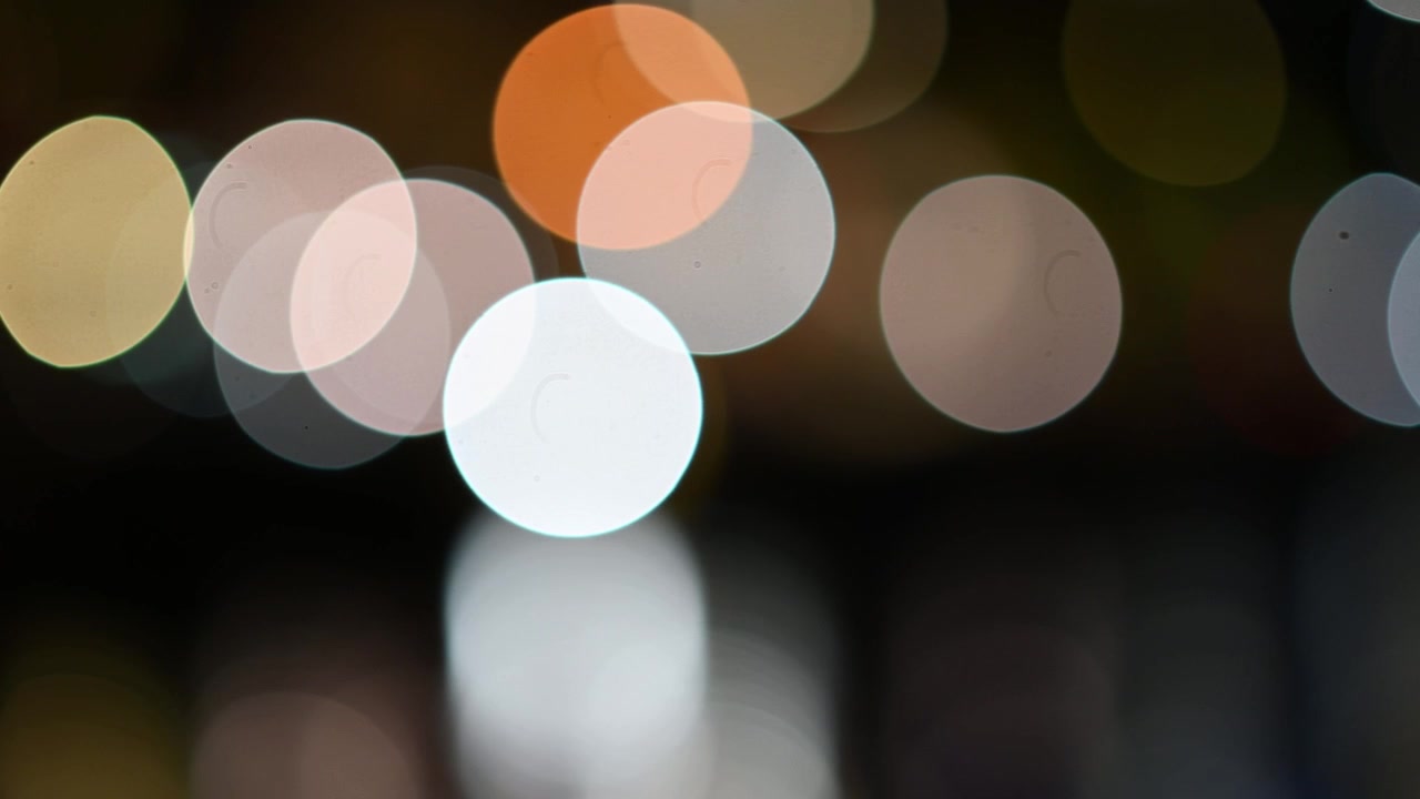 Colorful Blurred Bokeh Lights on a Dark Background