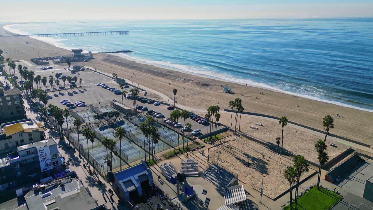 A drone shot of Muscle Beach at Venice Beach, California, capturing the iconic outdoor gym and surrounding scenery.