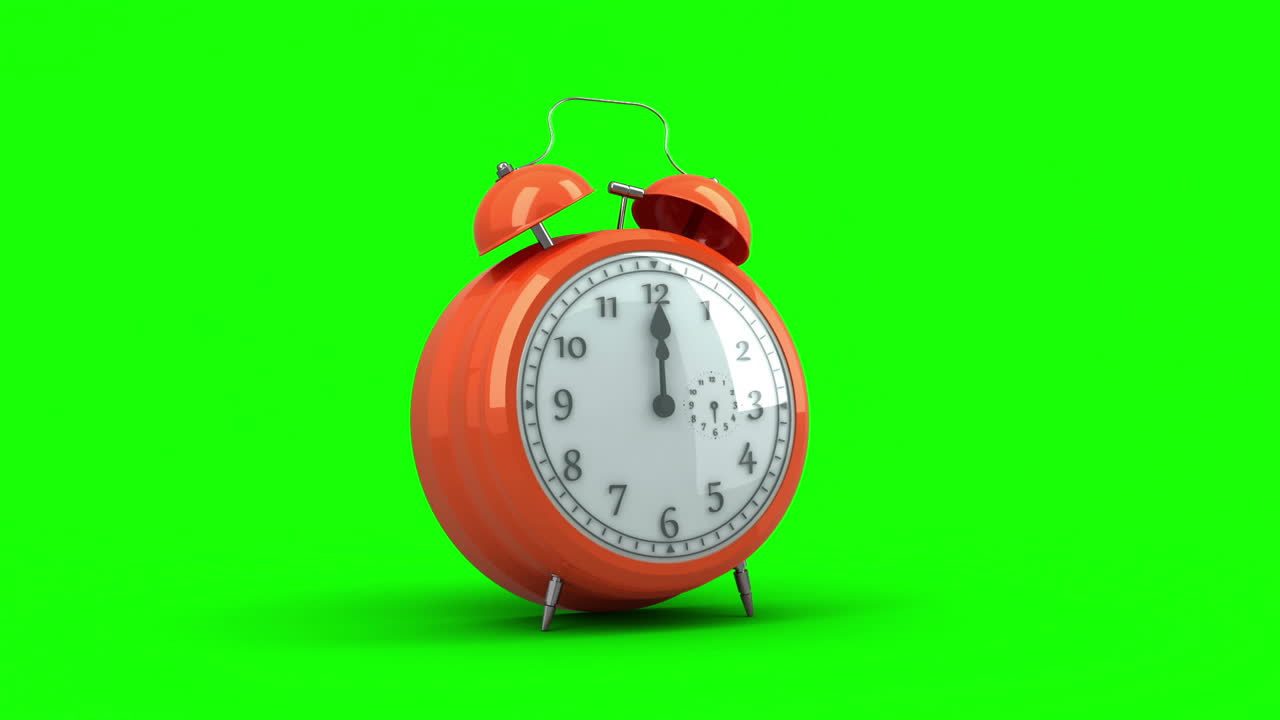 초록색 배경에서 울리는 알람 시계