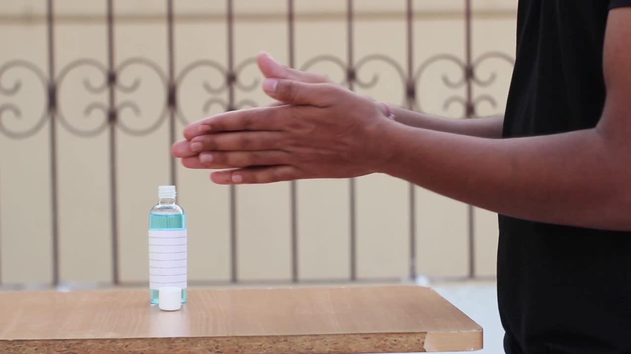 Young Asian boy applying sanitizer on hands, global epidemic recovered from virus Concept of health and safety life, corona virus, virus protection, pandemic in world, close shot