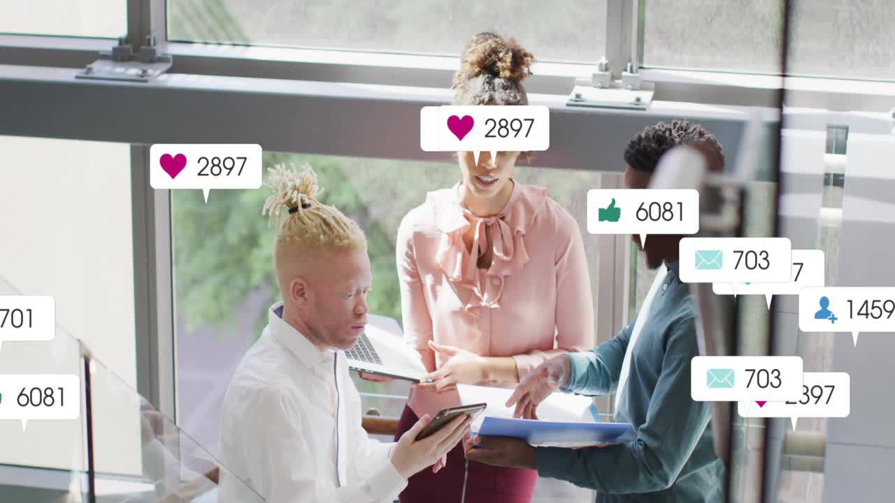 Team tapping tablet on stairs sparking floating badges over devices folder showing social metrics