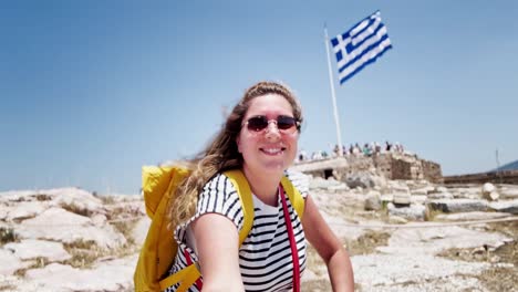 candid woman traveler at the acropolis viewpoint, athens, greece
