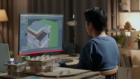 arquitecto trabajando en el diseño de la casa por la noche