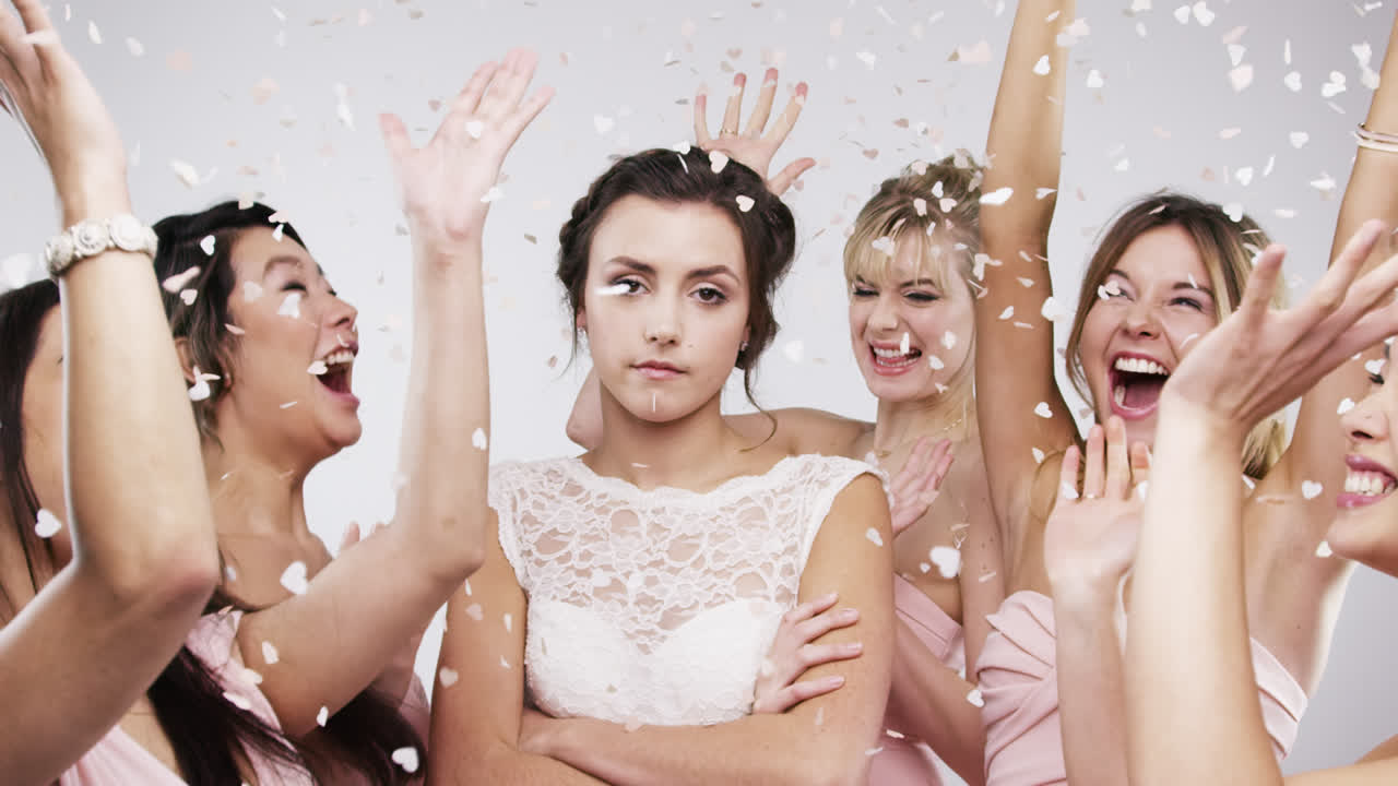 Beautiful bridesmaids throwing confetti slow motion wedding photo booth series
