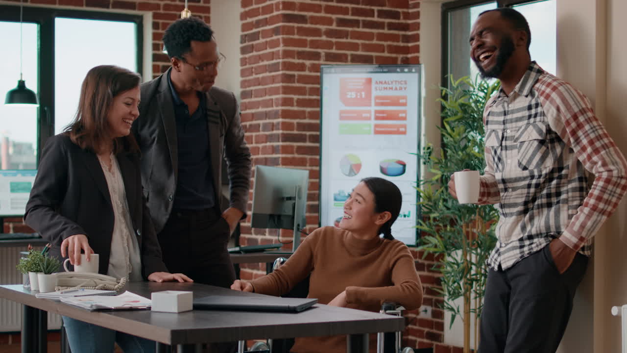 Multiehnic team of workers brainstorming ideas and laughing