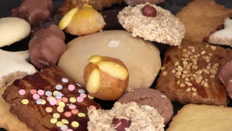 loopable selective focus view of delicious and freshly baked cookies on a plate in close up view.