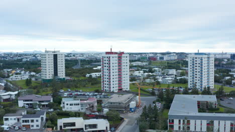 Drone-view-of-Reykjavik-neighborhood-with-residential-high-buildings.-Aerial-view-of-Reykjavik-downtown-district.-Birds-eye-panoramic-view-of-the-northernmost-capital-city-in-the-world