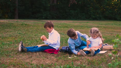 boy-in-glasses-explains-math-to-girl-sitting-near-classmate