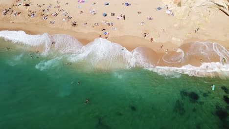 people relaxing on the beaches of the portuguese algarve