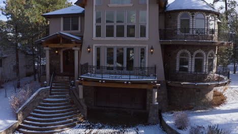 amazing snow covered homely christmas mansion feeling big bear california, drone aerial