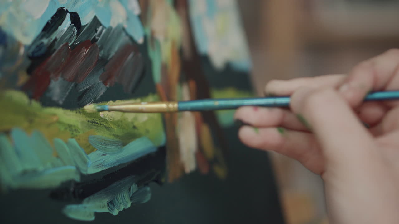 niño pintando un paisaje