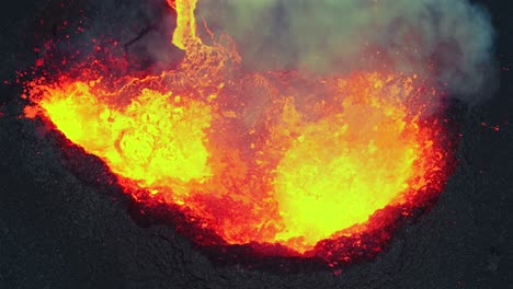 inside volcanic eruption, new earth birth on iceland, amazing crater spit lava - aerial 4k