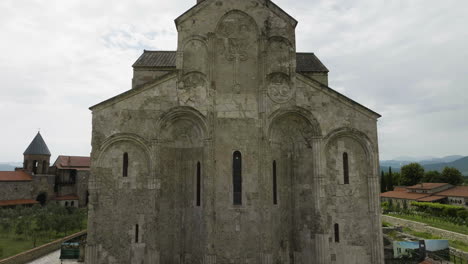 aerial close up and revealing details of alaverdi monastery in georgia