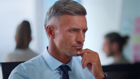 male employee with thoughtful face expression