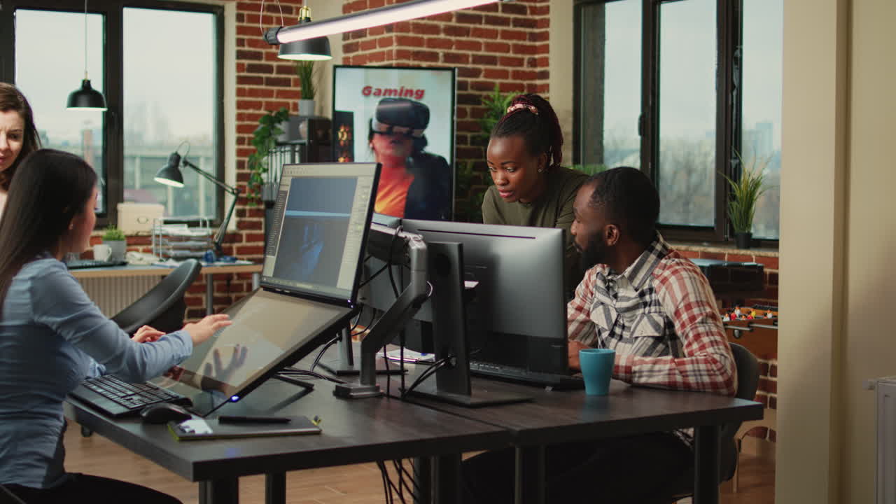 African american team of people looking at cad software on pc