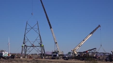 American-workers-assemble-high-tension-electrical-transformers-and-cables-to-build-US-infrastructure