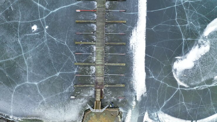 Amazing Frozen Lake In Winter in Norway - aerial shot