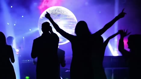 people dancing at a nightclub