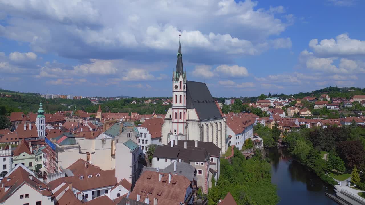 Smooth aerial top view flight Czech Republic historical Cesky Krumlov Vltava river in summer time 2023, world heritage in Bohemia