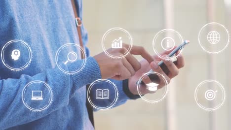 animación de múltiples iconos digitales contra la sección media de un hombre usando un teléfono inteligente al aire libre