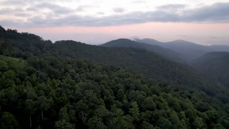 sunrise aerial at treetops along the blue ridge mountains near boone and blowing rock nc, north carolina