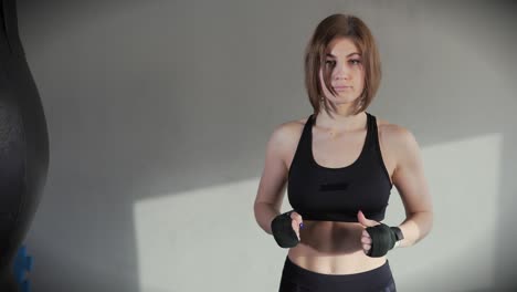 woman preparing for a boxing workout