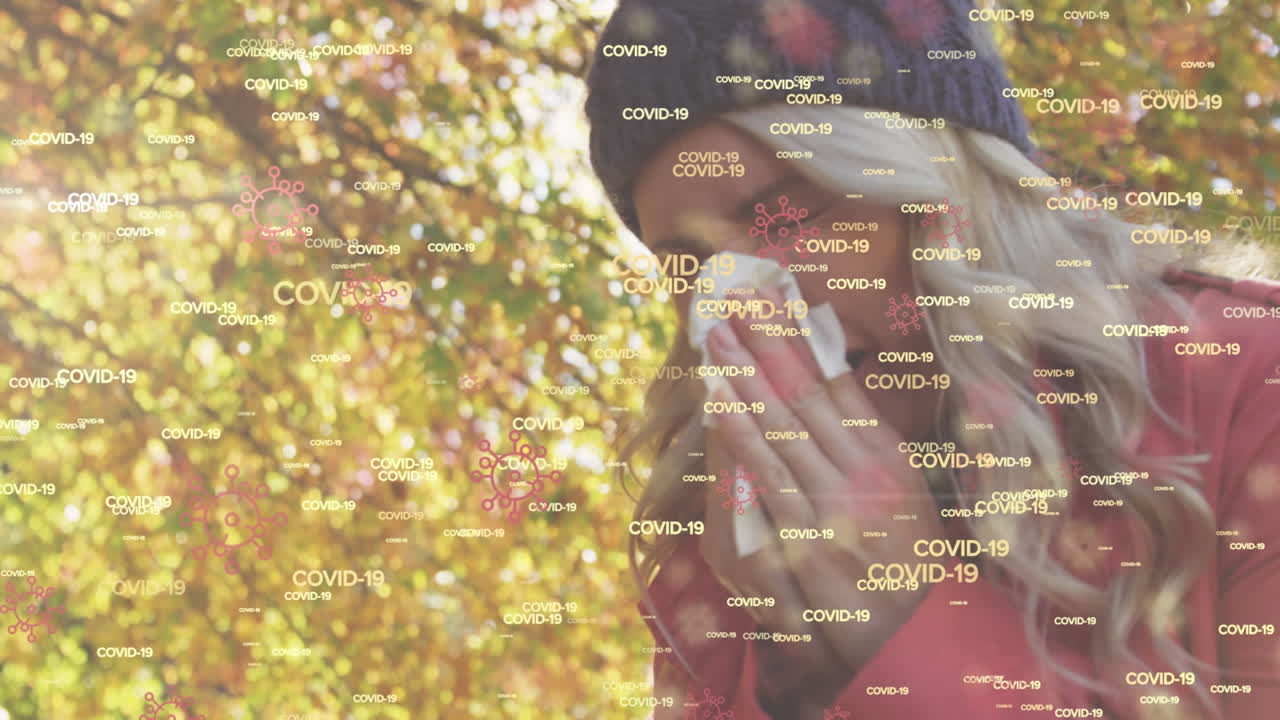 la animación muestra a una mujer estornudando con iconos de covid-19, que representan la pandemia.