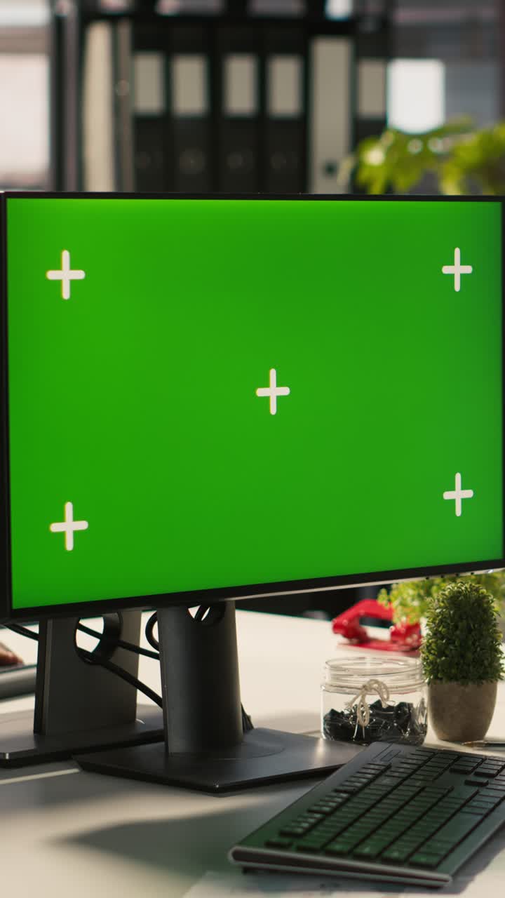 Vertical video Employee at work using isolated screen PC, reading paperwork