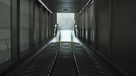 automatic mechanical indoor escalator of a large skyscraper in business district of paris. futuristic modern building. 4k hd.