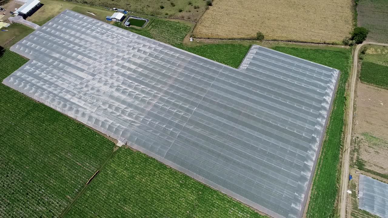 Flying over a greenhouse angle 03.