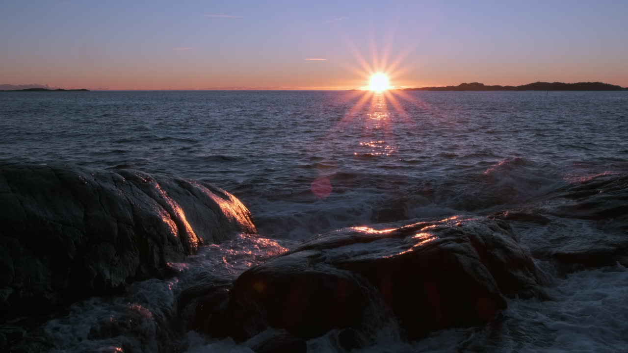 Mysterious Dark Ocean Rippling At Beautiful Golden Sunset Slow motion