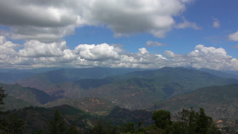 Day-timelapse-of-clouds-moving-over-the-hills-in-Phidim-in-Panchthar,-Nepal