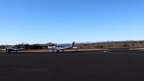 tarmac at pickens county airport with private aircraft