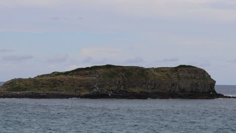 time-lapse of a small, tranquil coastal island