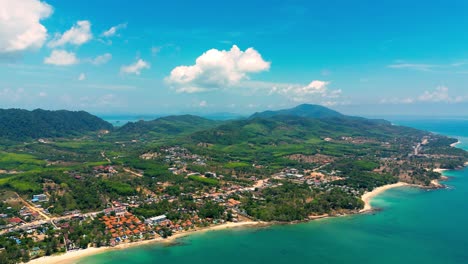 4K-Cinematic-nature-drone-footage-of-a-panoramic-aerial-view-of-the-beautiful-beaches-and-mountains-on-the-island-of-Koh-Lanta-in-Krabi,-South-Thailand,on-a-sunny-day