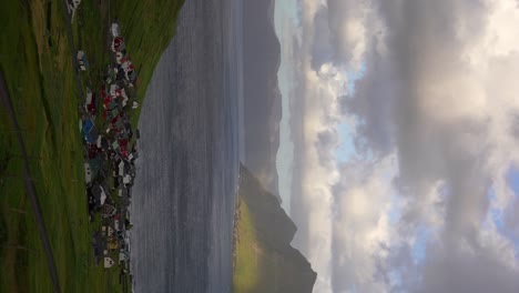 Static-vertical-shot-of-Funningur-village-with-its-turf-roof-church,-Faroe-Islands