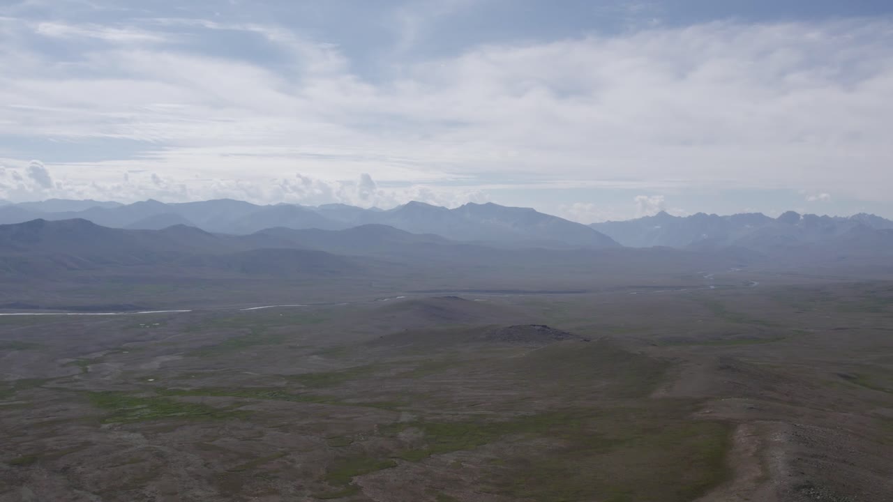 Deosai National Park’s high-altitude plains with misty mountains in the background. Gilgit-Baltistan, Pakistan